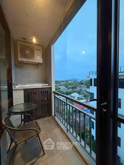 Charming balcony with scenic view, perfect for relaxation and enjoying the outdoors.