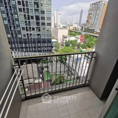 Urban balcony with cityscape view from high-rise building