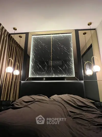 Luxurious bedroom with elegant lighting and modern decor