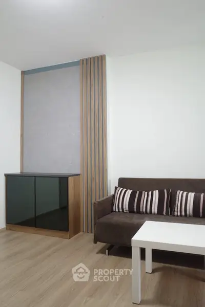 Modern living room with sleek furniture and stylish decor