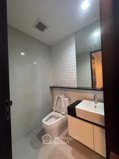 Modern bathroom with sleek fixtures and contemporary design