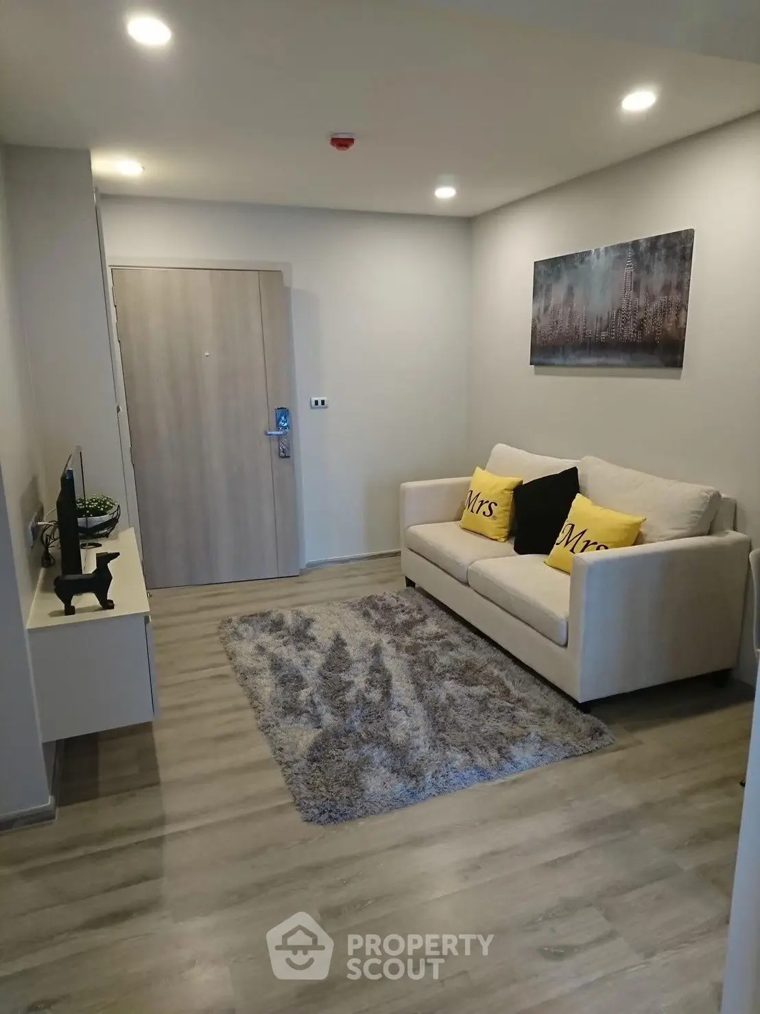 Cozy living room with modern decor and comfortable seating