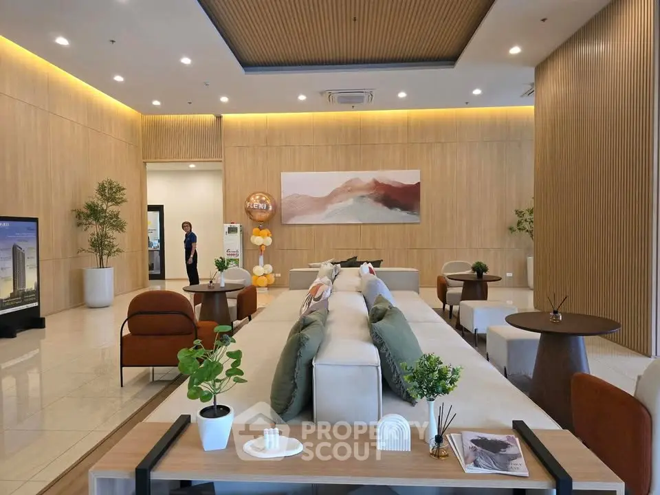 Luxurious modern living room with elegant decor and cozy seating in a stylish apartment.