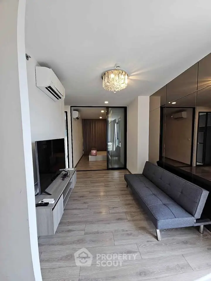 Modern living room with sleek design and stylish furniture