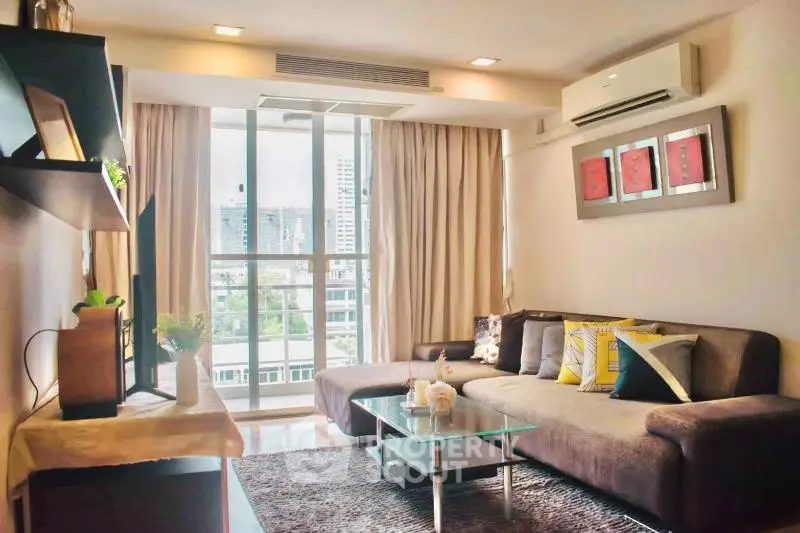 Spacious modern living room with large windows and stylish decor