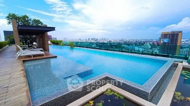 Luxurious rooftop infinity pool with stunning city skyline view