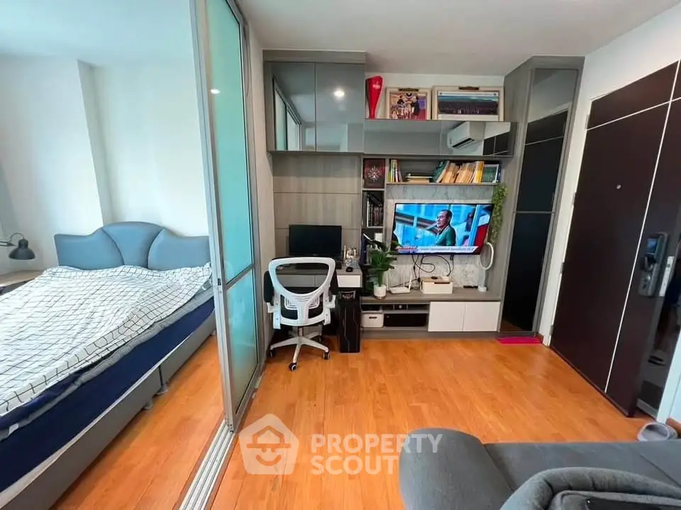 Modern studio apartment with cozy living area and stylish decor