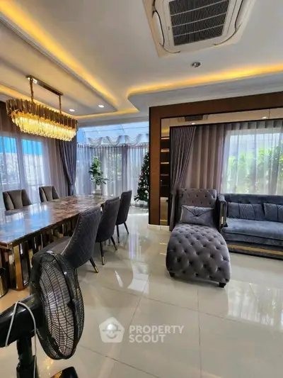 Luxurious living room with elegant furniture and modern lighting