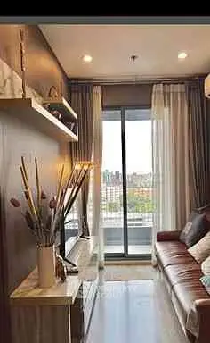 Stylish living room with balcony view and modern decor