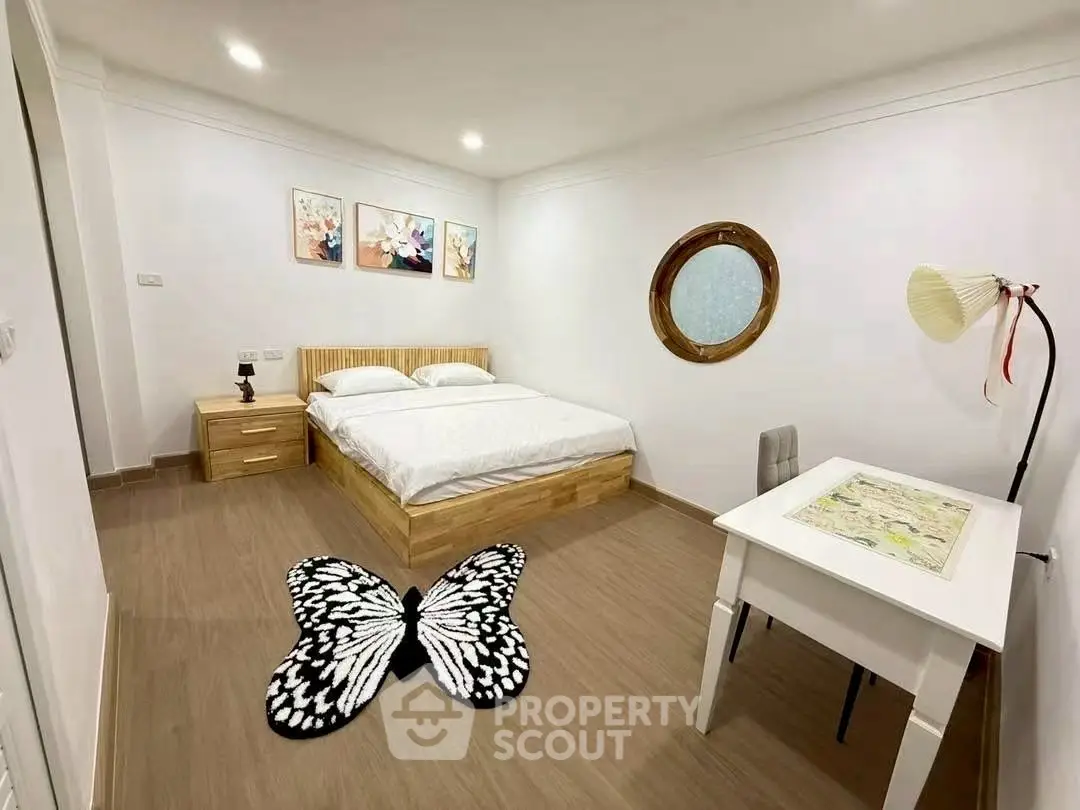 Modern bedroom with unique decor and cozy ambiance