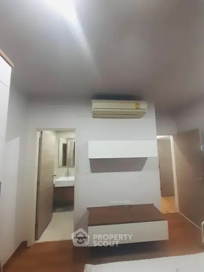 Modern bedroom with air conditioning and ensuite bathroom