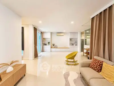 Spacious modern living room with elegant decor and natural light