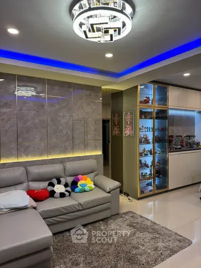 Luxurious living room with modern lighting and elegant decor