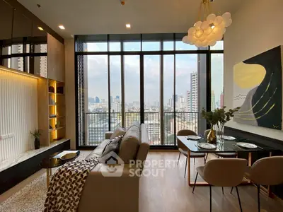 Luxurious modern living room with stunning city view and elegant decor