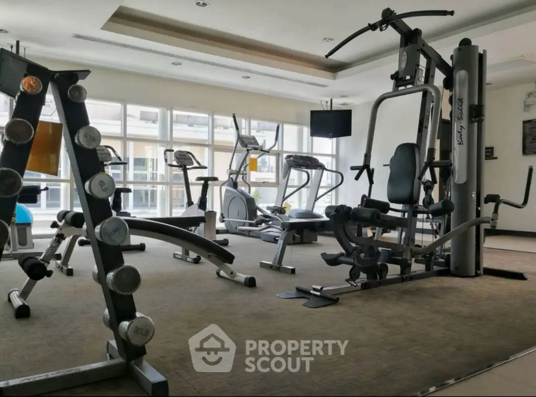 Modern gym with state-of-the-art equipment in a residential building