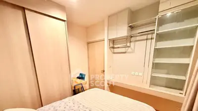 Cozy bedroom with built-in wardrobe and minimalist decor