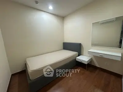 Cozy minimalist bedroom with single bed and modern decor