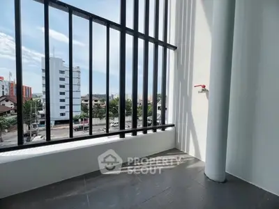Modern balcony with city view and sleek railing design