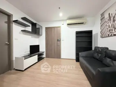 Modern living room with sleek furniture and air conditioning in a stylish apartment.