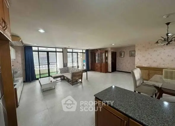 Spacious living room with open layout and modern furnishings