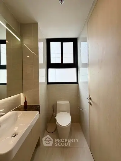 Modern bathroom with sleek fixtures and natural light