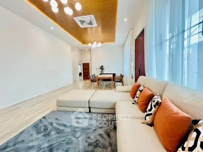 Spacious modern living room with elegant decor and ample natural light