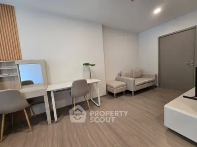 Modern living room with stylish furniture and wooden flooring, perfect for a cozy and elegant home.