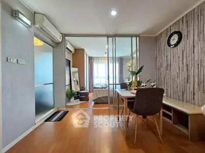 Modern apartment interior with open layout, featuring a stylish living area and elegant decor.
