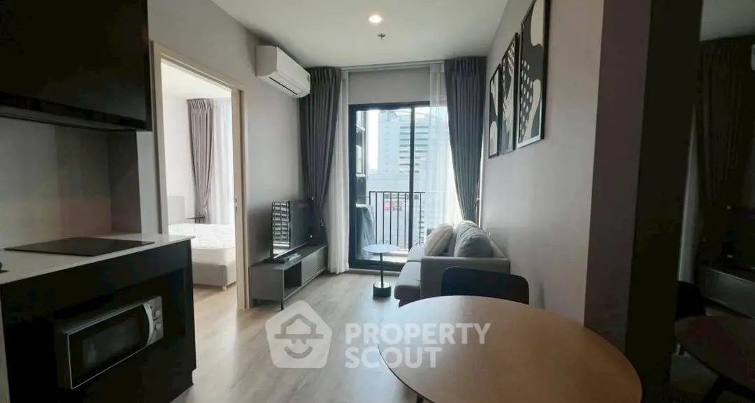 Modern apartment living room with balcony and city view