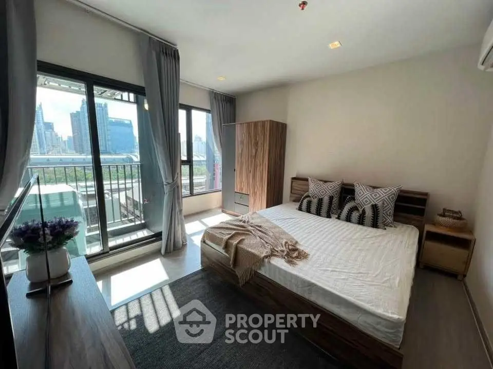 Modern bedroom with city view and stylish decor