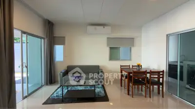 Modern living room with sleek furniture and natural light