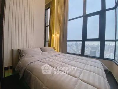 Luxurious bedroom with stunning city view and elegant decor