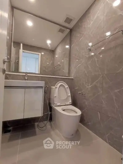 Modern bathroom with sleek design and elegant marble tiles