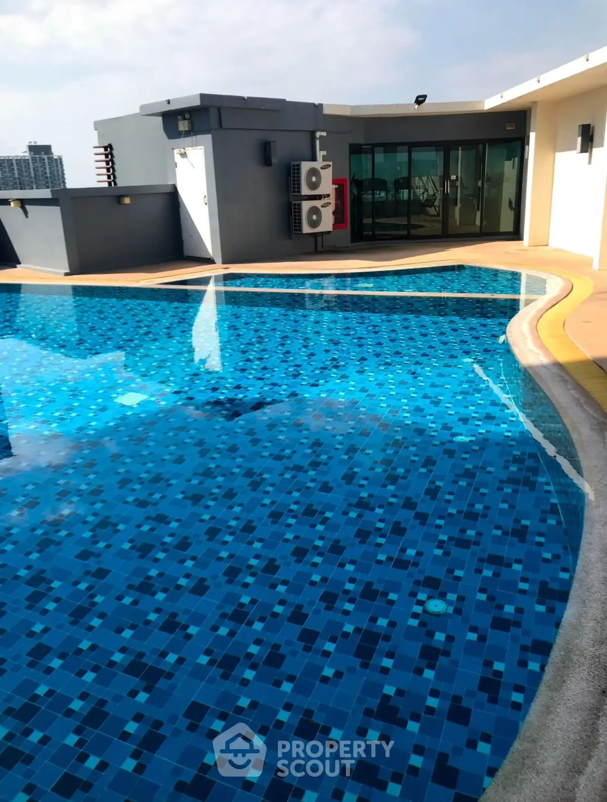Luxurious rooftop pool with stunning city views and modern amenities.