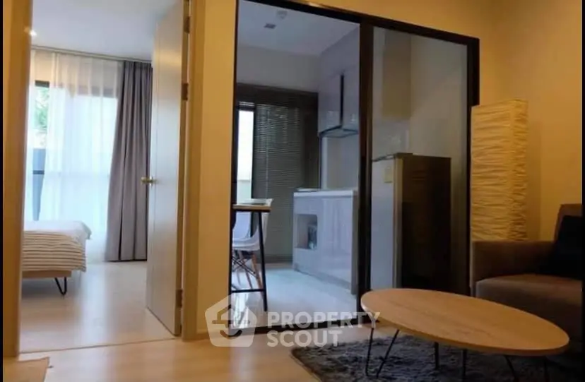 Modern apartment interior with cozy living room and sleek kitchen design