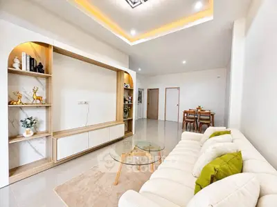 Modern living room with elegant decor and cozy seating area
