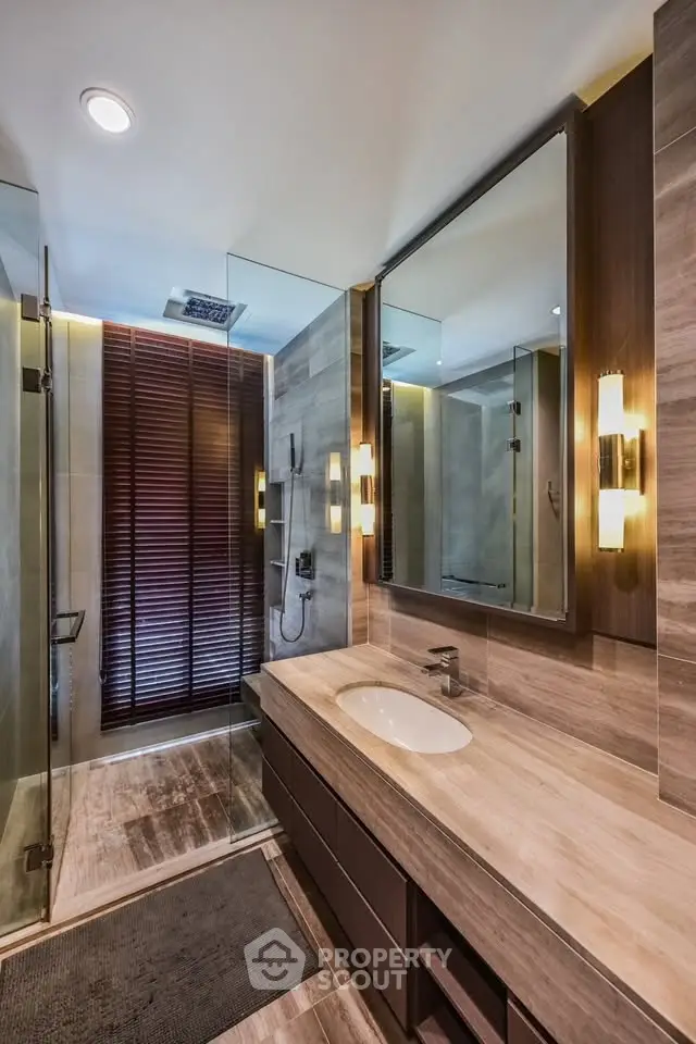 Luxurious modern bathroom with sleek design and elegant lighting