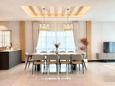 Luxurious dining area with elegant lighting and modern decor