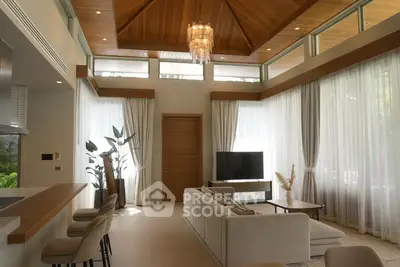 Luxurious modern living room with high ceilings and elegant decor