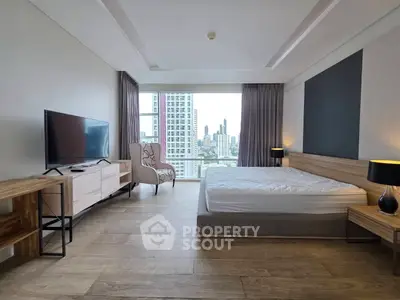 Spacious modern bedroom with city view and elegant furnishings