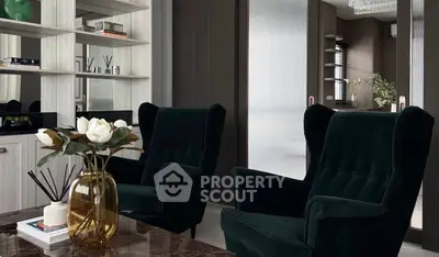 Luxurious living room with elegant dark chairs and modern decor