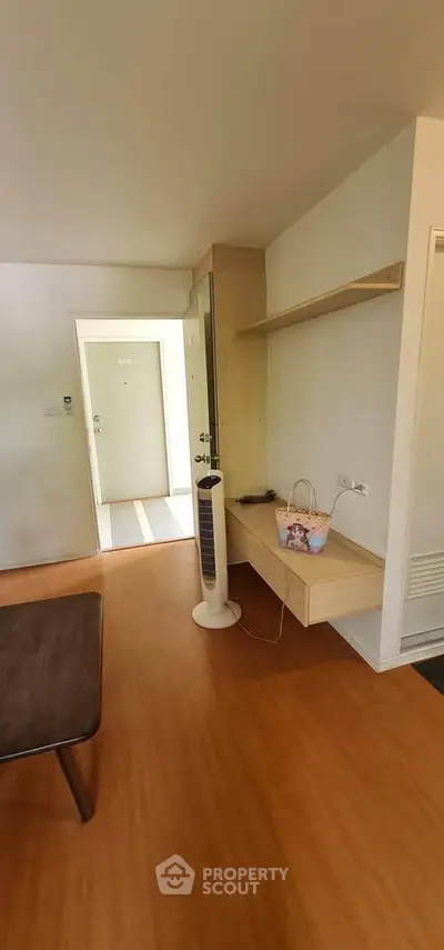 Modern apartment interior with wooden flooring and minimalist decor