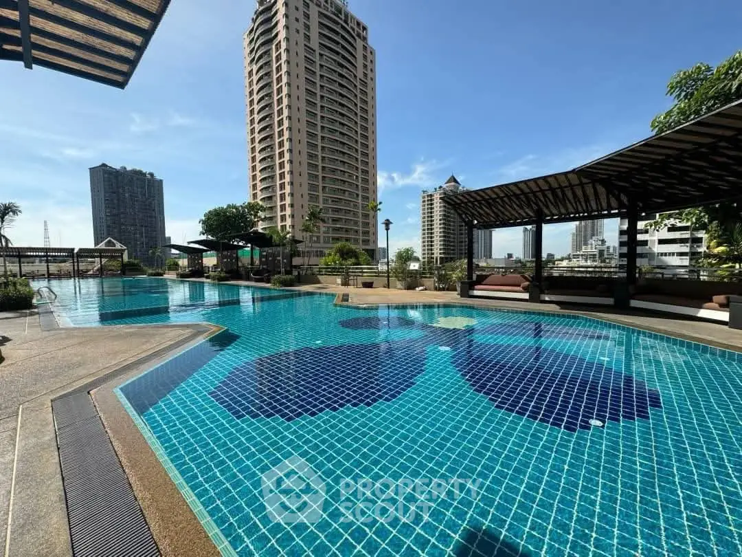 Luxurious rooftop pool with stunning cityscape views and modern lounging areas.