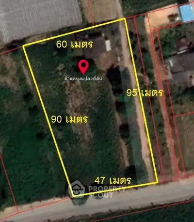 Aerial view of a land plot with dimensions marked in meters, ideal for development.