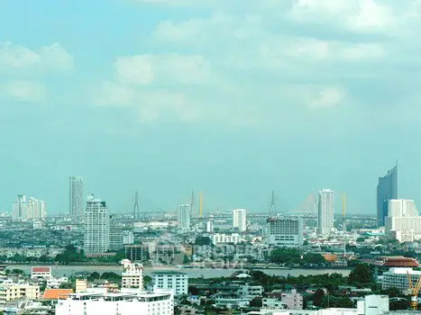 Stunning cityscape view showcasing modern skyline and river, ideal for urban living enthusiasts.