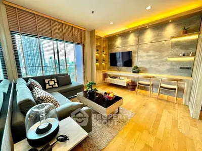 Modern living room with stylish decor and city view, featuring cozy seating and wooden accents.