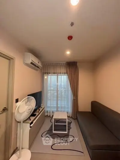 Cozy living room with modern decor and natural light