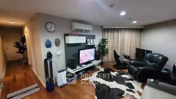 Modern living room with stylish decor and entertainment setup