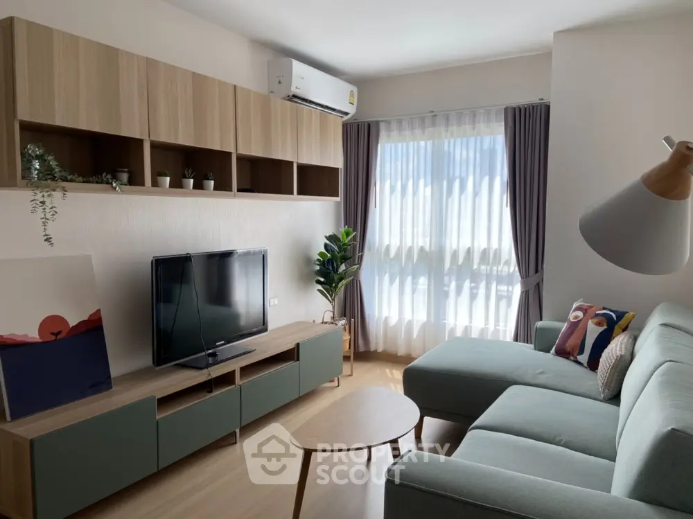 Modern living room with stylish furniture and natural light