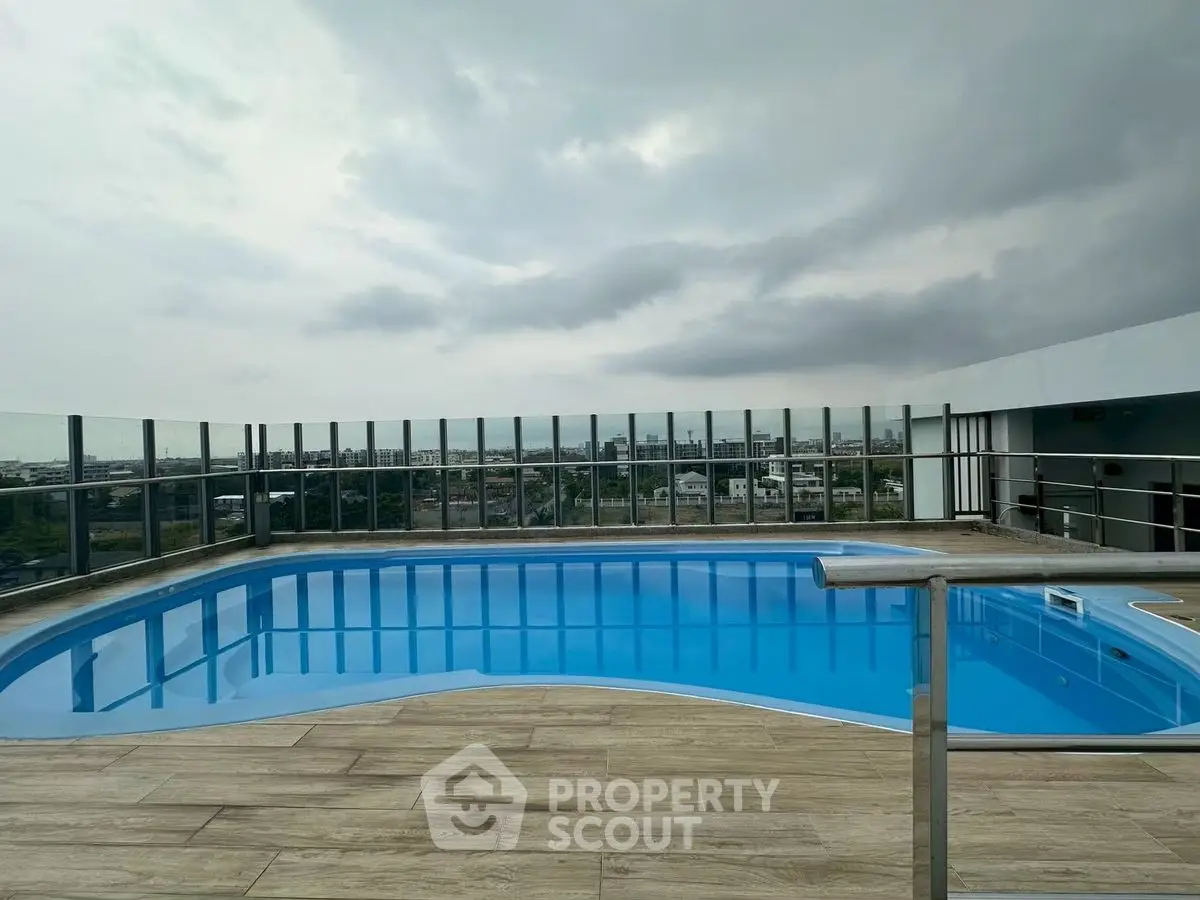 Stunning rooftop pool with panoramic city views and modern design.